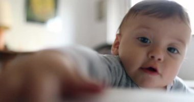 Baby toddler touching camera lens