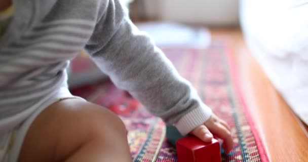 Baby Toddler Grabbing Piece Toy Floor — Stockvideo