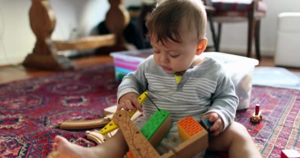 Adorable Baby Plays Toys Home Alone — Vídeo de Stock