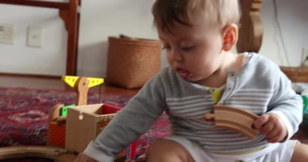 Infant Baby Playing Traditional Wooden Toys Home — Stockvideo