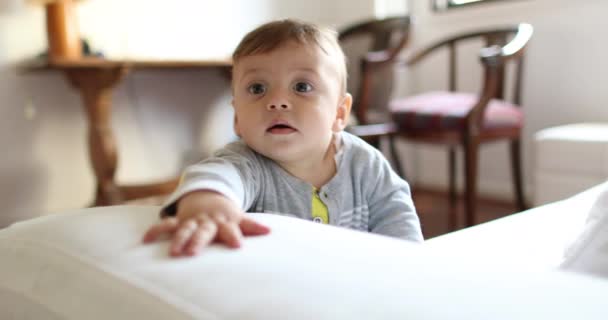 Cute Baby Boy Child Face Holding Sofa Standing — Vídeo de Stock