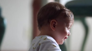 Bashful shy baby nodding no communication
