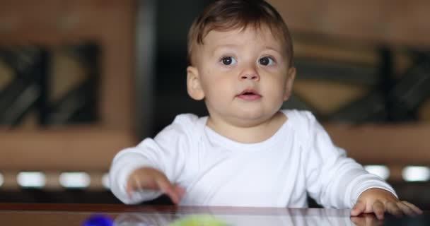 Beautiful Cute Baby Toddler Standing Holding Living Room Table — Stockvideo