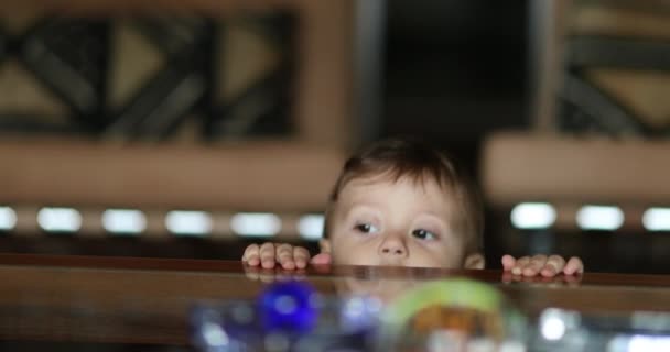 Adorable Cute Baby Appearing Table Peeking Head Out Hiding — Vídeo de Stock