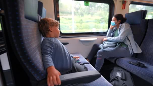 Behaved Little Boy Sitting Train Child Travels Tansportaiton Parent — Stock Video