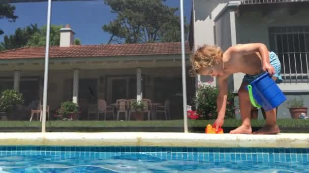 Toddler Baby Boy Walking Poolside Swimming Pool Setting Home — Vídeos de Stock