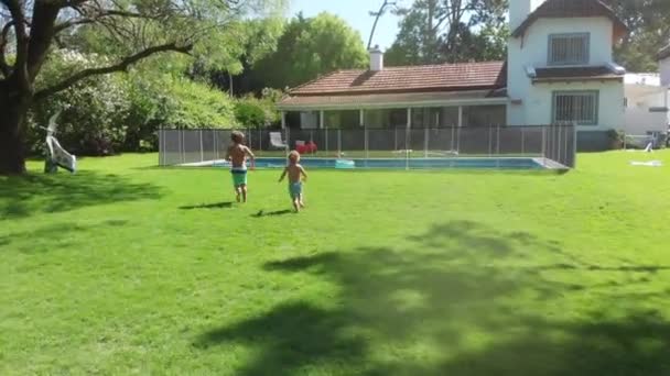 Children Running Outdoors Lawn Garden — стоковое видео