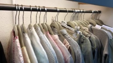 Clothing on hanger at shop