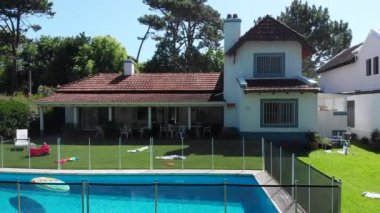 Drone clip of house exterior revealing traditional home
