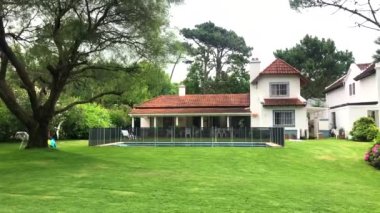 Residential home exterior  backyard with swimming pool