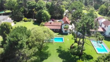 Exterior of home flying over with aerial drone over house