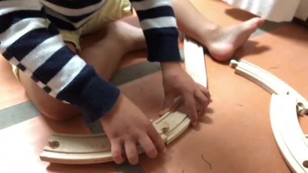 Toddler Baby Boy Playing Wooden Toy Roads — Vídeo de stock
