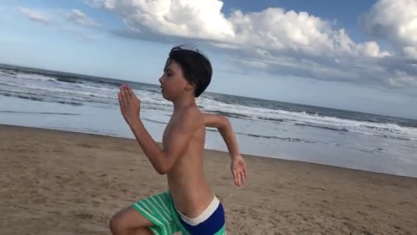 Young Boy Running Beach Shore — Stock video