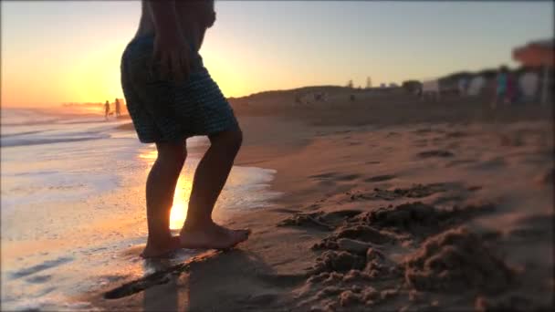 Baby Toddler Playing Sand Beach Sunflare Shining — Vídeo de Stock