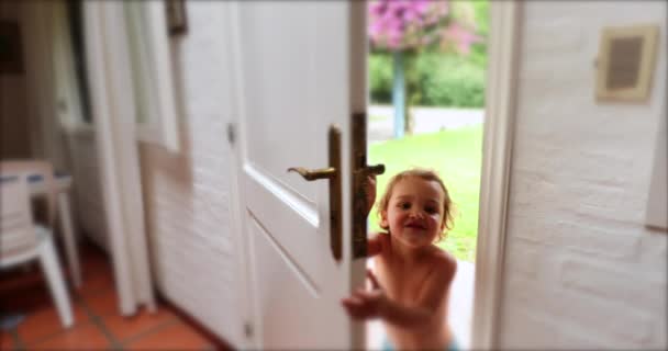 Infant Boy Opening Home Front Door Stepping Out — Stock videók