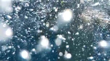 Revealing child emerging from under-water