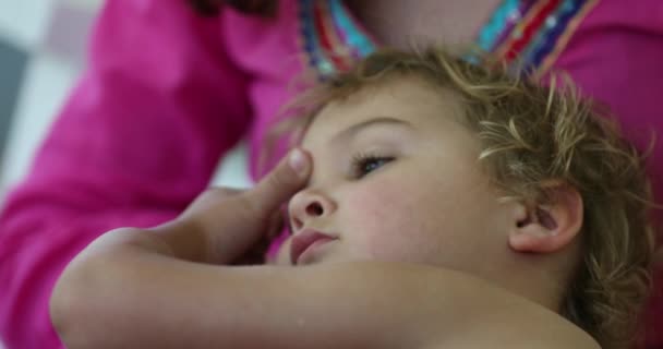 Toddler Boy Daydreaming Mom Lap Sleep — Stockvideo