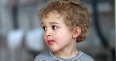 Boy eating apple fruit