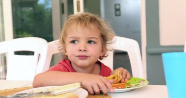 Toddler baby boy lost in thought, thinking