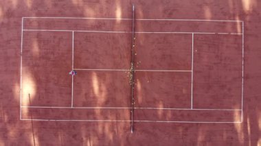 tennis court from above with two players training game