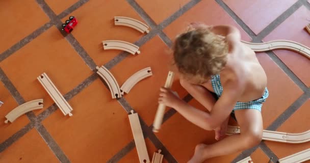 Toddler Playing Wooden Car Toys Seen — Vídeo de stock