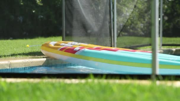Kid Playing Top Inflatable Mattress Swimming Pool — Stok video