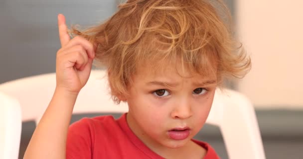 Toddler Baby Boy Starring Camera Playing Hair — Vídeo de Stock