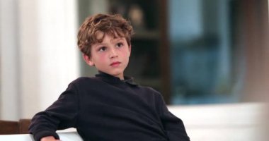 Kid lost in thought, thinkig