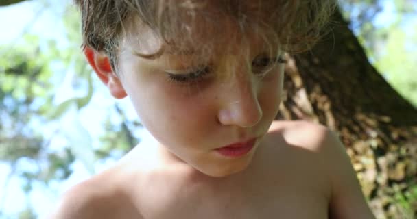 Boy Playing Cellphone Outdoors — Vídeos de Stock