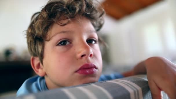 Kid Boy Home Seated Sofa Feeling Bored — Stok Video