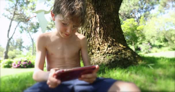 Handsome Child Playing Smartphone Outdoors Young Boy Looking Screen — Vídeo de Stock