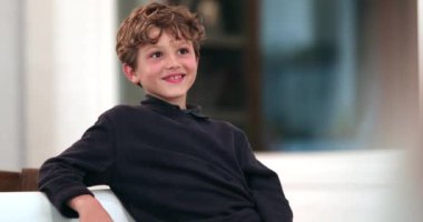 Spontaneous smile. Handsome child smiling, real life authentic candid kid