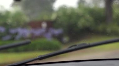 Wipers clearing rain in slow-motion