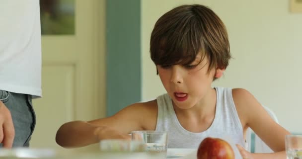 Young Boy Eating Gnocchi — Wideo stockowe