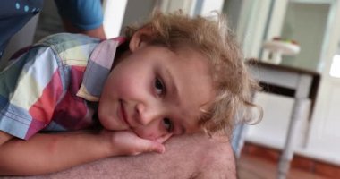 Toddler face bonding with father