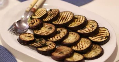 Slices of eggplant vegetable on plate