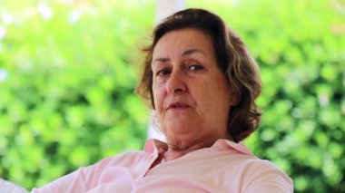 Contemplative Portrait of older woman thinking