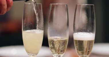 Serving drink, Close-up of champagne glass