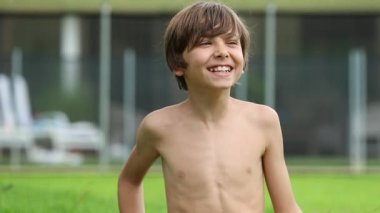 Portrait of happy kid smiling and laughing