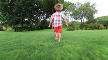 Cute kid running outside
