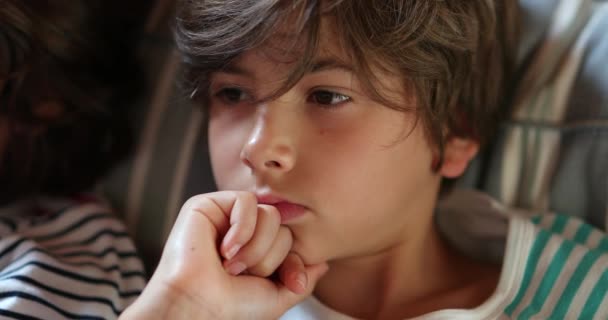 Candid Thoughtful Contemplative Child Thinking Paying Attention — Stockvideo