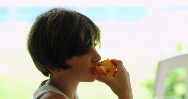 Young Boy Eating Healthy Fruit Child Eats Peach — Wideo stockowe