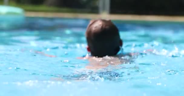 Young Boy Swimming Pool — Stockvideo