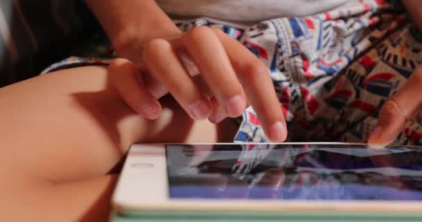 Child Hands Holding Tablet Device Touching Screen — 图库视频影像