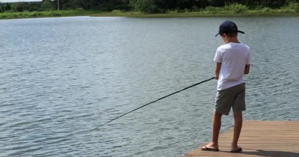 Child Fishing Lake Alone — Video Stock