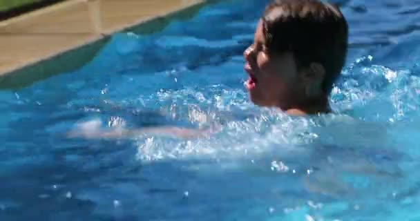 Kid Holding Swimming Poolside — стоковое видео