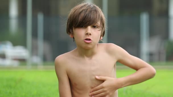 Portrait Young Boy Outdoors Holding Breath — Vídeo de Stock