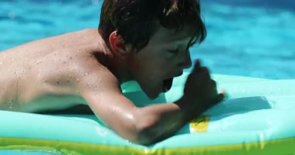 Young Boy Inflatable Mattress Child Having Fun Pool — стоковое видео