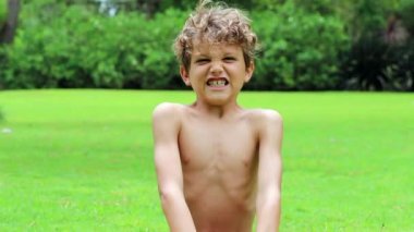 Young boy screaming from top of lungs in 120fps ultra slow-motion