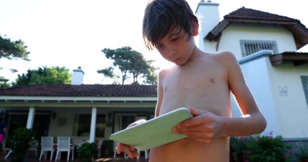 Child Boy Playing Holding Using Tablet Device — Vídeo de stock